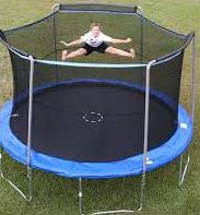 boy playing trampoline